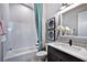 Simple bathroom with white herringbone tile and a bathtub at 4217 Burlington Mills Rd, Wake Forest, NC 27587