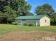 Detached two-car garage with extra storage space at 2164 Ray Rd, Spring Lake, NC 28390