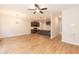 Open concept kitchen with island and stainless steel appliances at 804 N Magnolia Ave, Dunn, NC 28334