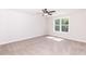 Spacious bedroom featuring neutral walls and carpet at 804 N Magnolia Ave, Dunn, NC 28334