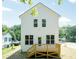 Two-story house with white siding and wooden deck at 804 N Magnolia Ave, Dunn, NC 28334