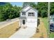 Two-story house with gray siding and attached garage at 804 N Magnolia Ave, Dunn, NC 28334
