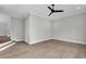 Spacious bedroom with hardwood floors and access to hallway at 8417 Portmarnock Ct, Wake Forest, NC 27587