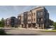 Modern 3-story townhouses with brick and fiber cement panel exterior at 714 Chatham View Rd # 17, Cary, NC 27511