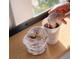 Stack of donuts and cup of coffee at 714 Chatham View Rd # 17, Cary, NC 27511