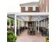 Restaurant patio with brick flooring and white pergola at 714 Chatham View Rd # 17, Cary, NC 27511