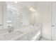 Bathroom with double vanity, quartz countertop, and walk-in shower at 2269 Abbeyhill Dr # 133, Raleigh, NC 27610