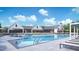 Resort-style pool with lounge chairs and cabanas at 2269 Abbeyhill Dr, Raleigh, NC 27610