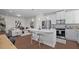 Open concept kitchen with island seating and stainless steel appliances at Tbd Channel Drop Dr # 94, Clayton, NC 27520