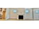 Bright living room featuring hardwood floors and a fireplace at 108 Swain St, Clayton, NC 27527