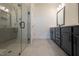 Elegant bathroom featuring dark vanity and large shower at 108 Swain St, Clayton, NC 27527