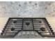 Stainless steel Whirlpool gas cooktop with 5 burners at 108 Swain St, Clayton, NC 27527