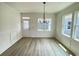 Charming dining room with hardwood floors and chandelier at 108 Swain St, Clayton, NC 27527