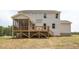 Two story house with deck, screened porch and backyard at 95 Quail Point Cir, Clayton, NC 27520