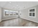 Spacious bonus room with hardwood floors and abundant natural light at 2651 Marchmont St, Raleigh, NC 27608
