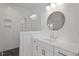 Modern bathroom with white tile, a walk-in shower, and a floating vanity at 2408 Everett Ave, Raleigh, NC 27607