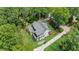 Bird's-eye view of a two-story home with a driveway and landscaping at 7621 Wingfoot Dr, Raleigh, NC 27615