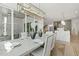 Open concept dining room with view into kitchen and backyard at 213 Westhampton Dr, Pittsboro, NC 27312