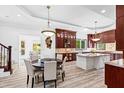 Gourmet kitchen with island, breakfast nook, and custom cabinetry at 40002 Worth, Chapel Hill, NC 27517