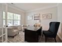 Home office with two armchairs and a large desk at 822 Biltmore, Sanford, NC 27332
