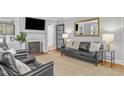 Cozy living room featuring a fireplace and leather furniture at 2704 Barmettler St, Raleigh, NC 27607