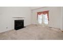 Living room with fireplace and carpet flooring at 424 Mountain Lake Dr, Raleigh, NC 27610