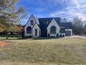 Modern two-story home exterior with manicured lawn at 43 Laurel Knoll Dr, Pittsboro, NC 27312