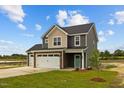 Two-story home with two-car garage and attractive landscaping at 188 Hillwood Dr, Sanford, NC 27332