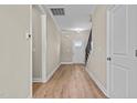 Bright entryway with hardwood floors and staircase at 147 Hillwood Dr, Sanford, NC 27332