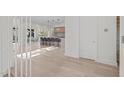 Bright entryway with open view to kitchen and living areas at 1435 Duplin Rd, Raleigh, NC 27607