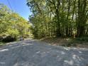 Wooded lot with street view, ready to build your dream home at 5308 Parkwood Dr, Raleigh, NC 27612