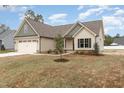 House exterior showcasing a charming design and curb appeal at 125 Prosecco Dr, Princeton, NC 27569