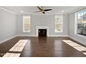 Bright living room with hardwood floors and fireplace at 10210 Sablewood Dr # 101, Raleigh, NC 27617