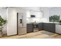 Modern kitchen with stainless steel appliances and dark gray cabinetry at 106 Broadway St # 101, Durham, NC 27701