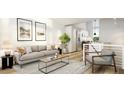 Open concept living room with a neutral color palette and kitchen view at 106 Broadway St # 207, Durham, NC 27701