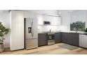 Modern kitchen with stainless steel appliances and dark gray cabinetry at 106 Broadway St # 207, Durham, NC 27701