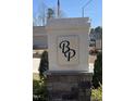 Community entrance with a brick sign featuring the community's logo at 122 Vega Loop # 61, Sanford, NC 27330
