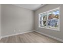Spacious bedroom with large windows and light gray walls at 545 Husketh Rd, Youngsville, NC 27596