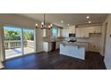 Modern kitchen with granite countertops and stainless steel appliances at 1341 Underbrush Dr, Durham, NC 27703