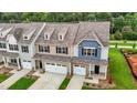 Three townhouses with attached garages, and nicely landscaped lawns at 818 Pryor St # 55, Mebane, NC 27302