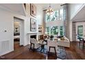 Bright living room with high ceilings, fireplace and hardwood floors at 4213 Burlington Mills Rd, Wake Forest, NC 27587