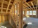 Unfinished staircase leading to upper level of home at 167 Bering Circle # 10, Angier, NC 27501