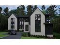 Modern farmhouse style home with a mix of black and white accents at 2419 Medway Dr, Raleigh, NC 27608