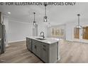 Open concept kitchen with island and stainless steel appliances at 210 Lilliput Ln, Wake Forest, NC 27587