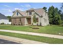 House exterior view, landscaped lawn at 112 Lambert Ln, Fuquay Varina, NC 27526