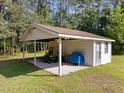 Detached workshop with covered parking and additional storage at 3721 Brightwood Ln, Durham, NC 27703