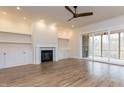 Spacious living room with hardwood floors and fireplace at 1690 Terry Rd, Durham, NC 27712