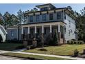 Two-story craftsman home with front porch at 1113 Destination Dr, Apex, NC 27523