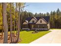 House exterior showcasing a stylish design and landscaping at 40 Harvest View Way, Franklinton, NC 27525