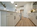 Modern kitchen with white cabinets and quartz countertops at 154 Swain St, Clayton, NC 27527